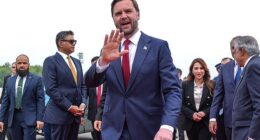 Vance waves hello upon his arrival for the US-Iran peace talks in Islamabad on April 11