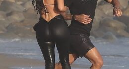 Kim Kardashian was seen making out with Lewis Hamilton for the first time as they were spotted at a beach in Malibu on Tuesday