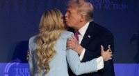 President Donald Trump (right) gives Erika Kirk (left) a hug and a kiss as he arrives Friday at Dream City Church in Phoenix, Arizona, for a Turning Point USA 'Build the Red Wall' event