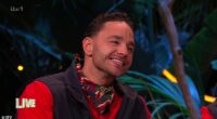 Smiling Adam Thomas awkwardly glossed over his aggressive row with Jimmy Bullard as he addressed their 'drama' during the I'm A Celebrity South Africa live final on Friday night