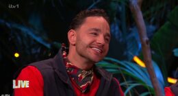 Smiling Adam Thomas awkwardly glossed over his aggressive row with Jimmy Bullard as he addressed their 'drama' during the I'm A Celebrity South Africa live final on Friday night