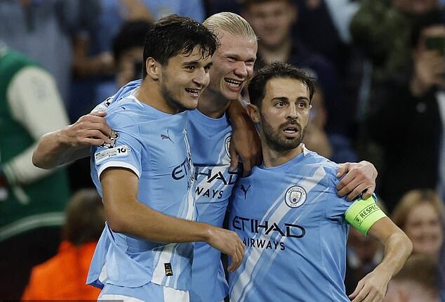 Bernardo Silva was crucial in allowing Abdukodir Khusanov (left) to settle after a horror start to his debut against Chelsea last year