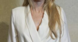 Angelina Jolie sparked a wild fan frenzy that she had been replaced by a body double after making an 'unrecognizable' appearance at Shanghai Fashion Week