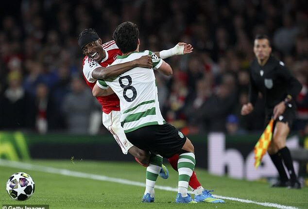 Noni Madueke came off injured after this collision in the second half at the Emirates