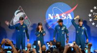 The crew of Artemis II received a standing ovation on Saturday as they returned to NASA's Johnson Space Center in Houston, Texas