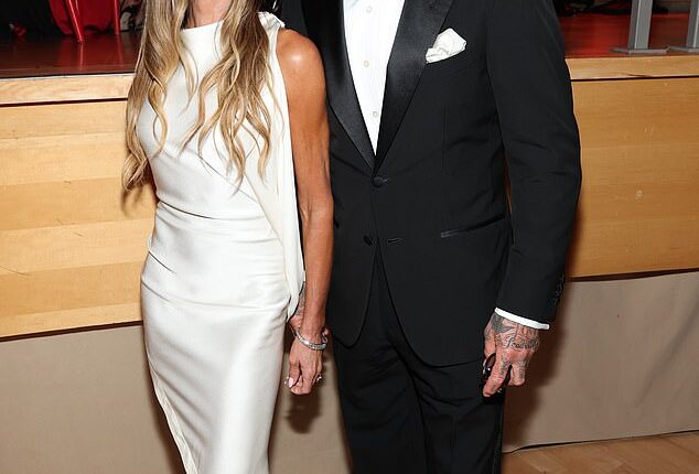 Victoria Beckham was somewhat less than in fits of hilarity when she became the butt of a joke at the star-studded Time100 Gala in New York, where she is pictured with David