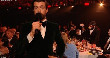 BRITs viewers were left stunned after Robbie Williams ' iconic monkey appeared to 'snort drugs' in a live comedy skit during Saturday night's ceremony