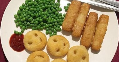 Fish fingers and potato smiley faces are a beloved British school dinner staple