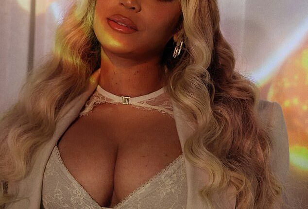 Beyoncé, 44, sent pulses racing in lace lingerie as she promoted her haircare line in an album of snaps shared to Instagram on Monday