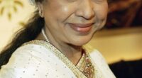 Asha Bhosle, the famed Indian playback singer and Bollywood legend, has died of cardiac arrest at age 92; pictured in 2005