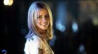 Britney Spears smiling as she looks back in a scene from the film 'Crossroads', 2002