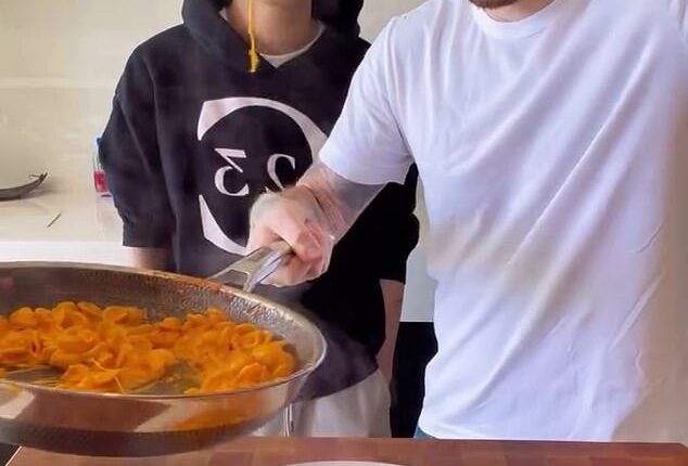 Brooklyn Beckham is mocked in his latest cookery video for 'boiling some pasta' as fans notice he's hanging on to his favourite £220k watch gifted by dad David