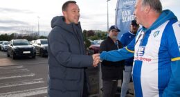 John Terry met Colchester United fans before watching their match against Accrington