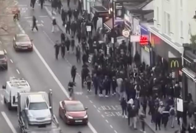 A Clapham security guard has described the moment he was forced to lock customers inside the store as mobs of feral youths ran wild