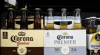 Corona brewer says shoppers are going for cheaper beer and wine, as it grows more cautious on demand