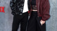 Millie Bright, pictured with her new influencer barber boyfriend Tom Mitchell at the Tyson Fury vs Arslanbek Makhmudov fight earlier this month, is retiring from football