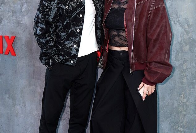 Millie Bright, pictured with her new influencer barber boyfriend Tom Mitchell at the Tyson Fury vs Arslanbek Makhmudov fight earlier this month, is retiring from football