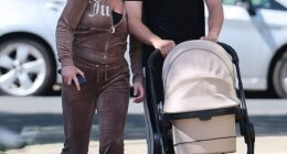 Freddy Brazier was every inch the doting dad as he and girlfriend Holly Swinburn stepped out for the first time with baby daughter Isla Jade in Essex this week