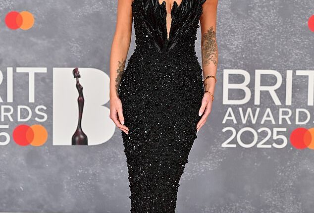GK Barry turned heads as she attended The BRIT Awards 2025 , held at London's O2 Arena on Saturday night - and her outfit featured a sweet nod to her girlfriend Ella Rutherford