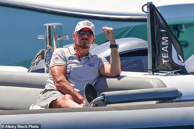 Larry Ellison, founder of Oracle, pictured with Challenger’s Oracle Team USA during the 35th America’s Cup in Bermuda in 2017. The tech giant is slashing jobs while ramping up AI spending