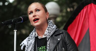 Grace Tame is pictured speaking during a rally for Gaza at Hyde Park, Sydney, in August