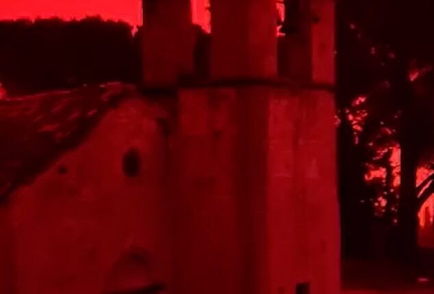 The Greek island of Crete has been cloaked in a choking Saharan dust storm as violent winds and a tornado battered the region, forcing Easter holiday flights from the UK to divert and turning the sky an eerie red-orange