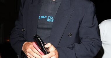 Harry Styles, 30, wore a voyeuristic graphic T-shirt for his low-key outing on Thursday night as he stepped out in Soho, London for dinner