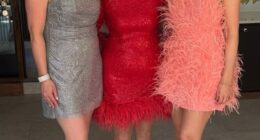 Holly Willoughby (L) put on a leggy display in a feathered mini dress as she partied with lookalike mum Linda (C) and sister Kelly (L) at Studio 54 themed family bash on Sunday