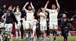 Leeds players celebrate their victory at arch-rivals Manchester United on Monday that was considerably more comfortable than the 2-1 scoreline suggests