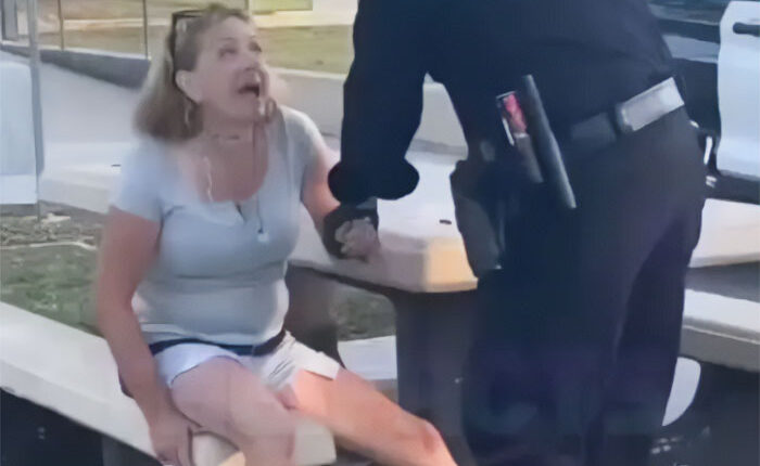 “Karen” Faces Instant Karma After Making Racist Comments To Kids Then Biting Cop