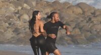 Kim Kardashian was seen making out with Lewis Hamilton for the first time as they were spotted at a beach in Malibu on Tuesday