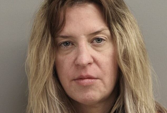 Lindsay Lohan ’s stepmother Kate Major appeared dishevelled and downcast in a newly released mugshot following her arrest over an alleged altercation with estranged husband Michael Lohan