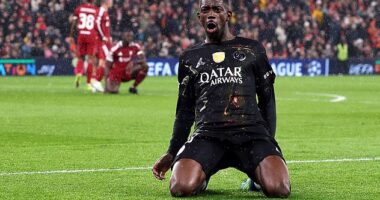 Ousmane Dembele celebrates scoring the first goal of the game for PSG against Liverpool