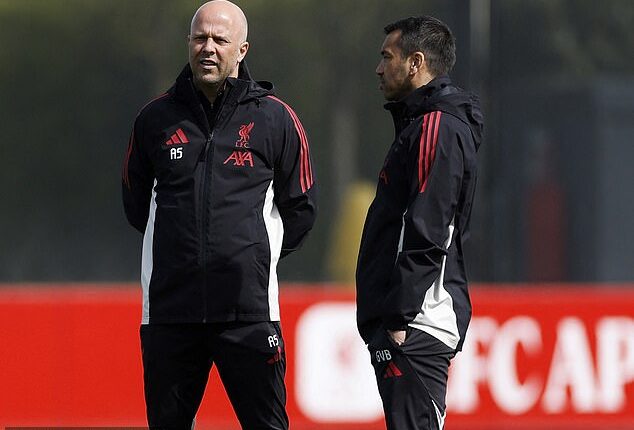Arne Slot could be set to lose one of his key coaches, Giovanni van Bronckhorst (right)