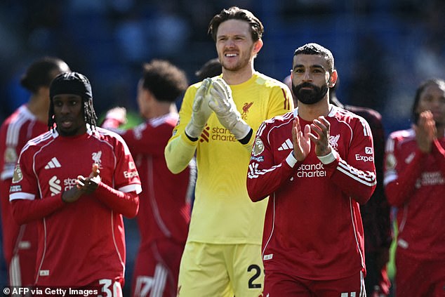 Freddie Woodman (centre) is set for an extended run for Liverpool after injuries to Alisson and Giorgi Mamardashvili