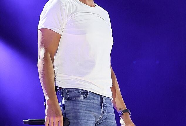 Country star Luke Bryan was hit in the face by a flying object while performing at the North Dakota State Fair on Saturday; seen on 2025