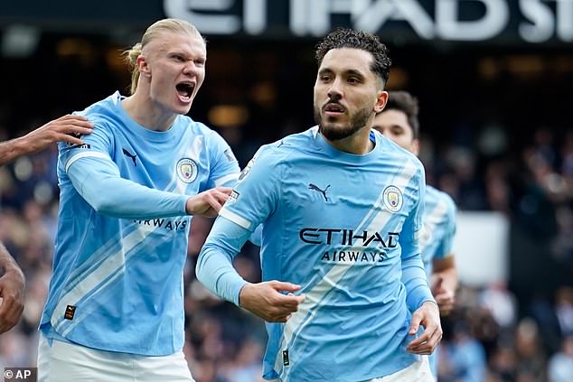 Rayan Cherki (right) and Erling Haalnd (left) were on the scoresheet for Manchester City as they beat Arsenal in a crunch Premier League game
