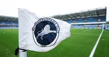 Millwall are considering legal action over the use of the club's badge on an illustration of a KKK figure in an educational children's booklet