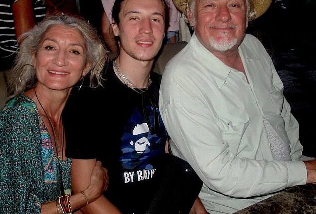 Finbar Sullivan, centre, with his mother Leah Seresin and father Christopher Sullivan, who went to the scene as soon as he heard his son had been caught up in the violence