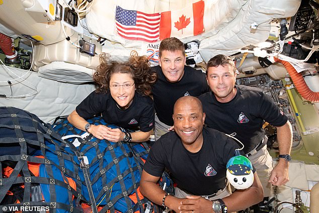 The Artemis II crew, comprising NASA's Reid Wiseman (second from right), Victor Glover (right), Christina Koch and Canadian astronaut Jeremy Hansen, is scheduled to splash down off the coast of San Diego, California, at 8.07pm ET