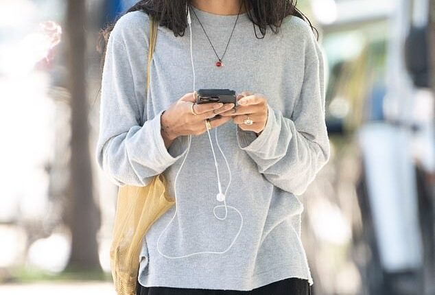 Zoe Kravitz flashed her new diamond engagement ring from Harry Styles when she stepped out in New York City on Monday