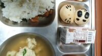 Social media videos show young students in the East Asian nation loading their metal trays up with freshly cooked curries