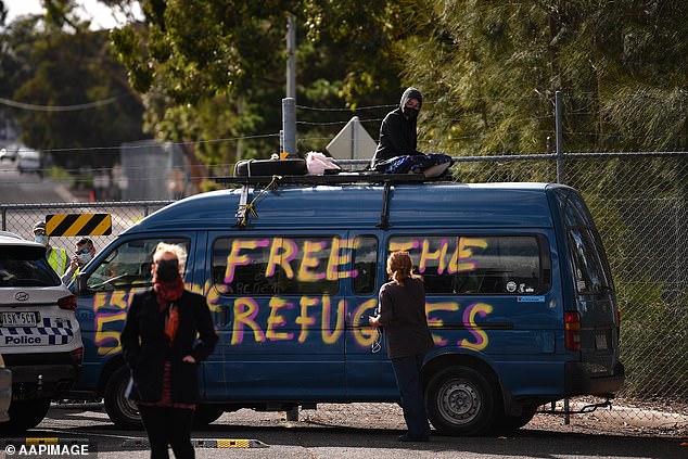 Two convicted criminals have been allowed to stay in the country after a failed deportation bid. Pictured are protesters blocking an entrance to the Melbourne Immigration Transit Centre in Broadmeadows in 2022