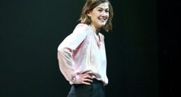 Rosamund Pike is pictured bowing at the curtain call during a performance of Inter Alia at Wyndham's Theatre on April 7