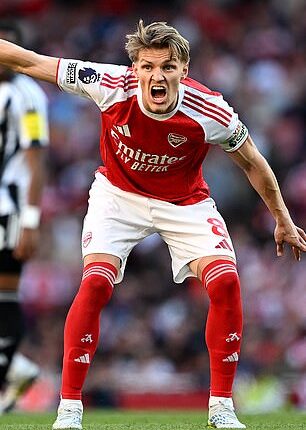 Paul Scholes believes Arsenal captain Martin Odegaard (pictured) is a major problem for them