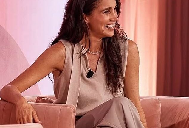 Prince Harry wasted no time in escaping Meghan Markle's controversial Her Best Life retreat in Sydney. Above, the Duchess of Sussex on stage at the Intercontinental Coogee on Friday