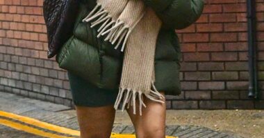 Raye cut a low-key figure as she headed to the recording studio in rainy London on Tuesday morning