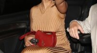 Raye looked delighted as she left the Ivor Novellos clutching yet another award at Grosvenor House in London on Thursday as fellow winner KT Tunstall debuts new shaved head mullet look