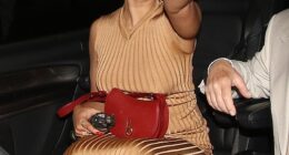 Raye looked delighted as she left the Ivor Novellos clutching yet another award at Grosvenor House in London on Thursday as fellow winner KT Tunstall debuts new shaved head mullet look