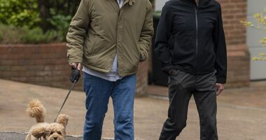 Scott Mills has been pictured for the first time since he was sacked from the BBC. The former Radio 2 Breakfast Show host was seen on a dog walk with his husband Sam Vaughan near their Hertfordshire home